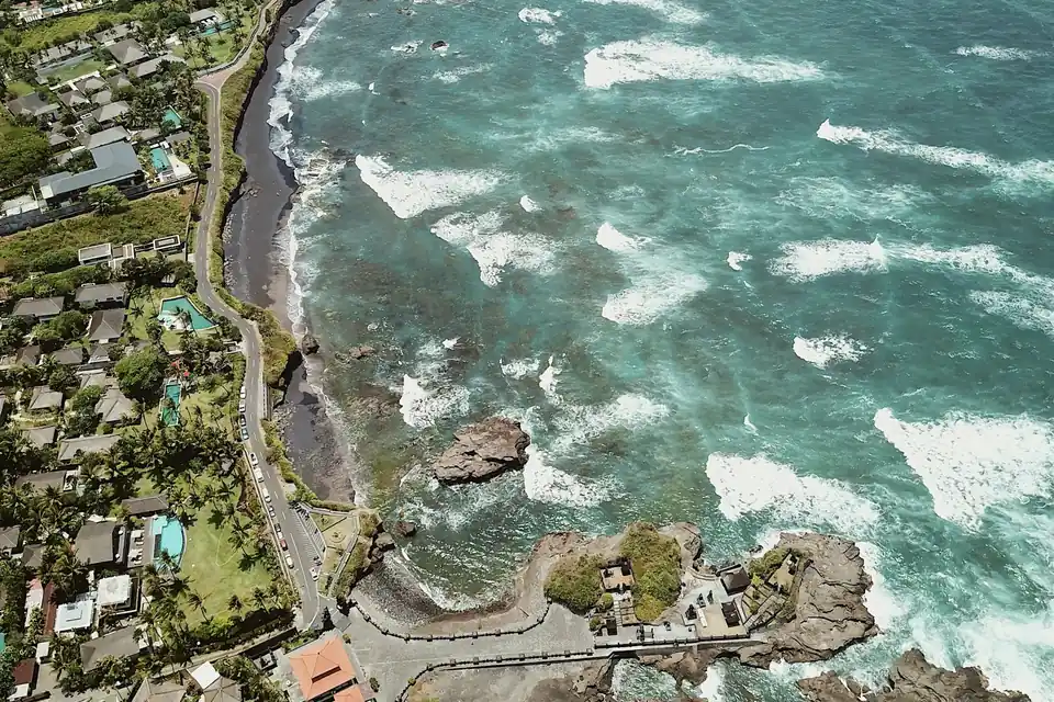 Aerial view of villas along the Canggu coastline