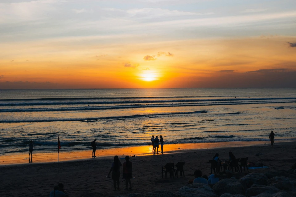 People watching the sunset on Canggu beach, Bali