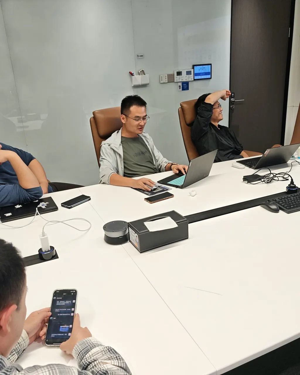People meeting around a boardroom table