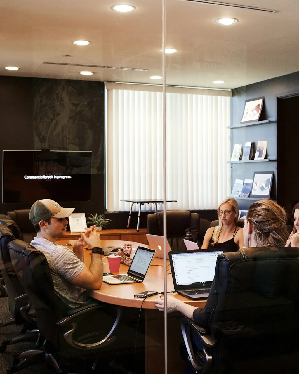 Team meeting around a table in an office